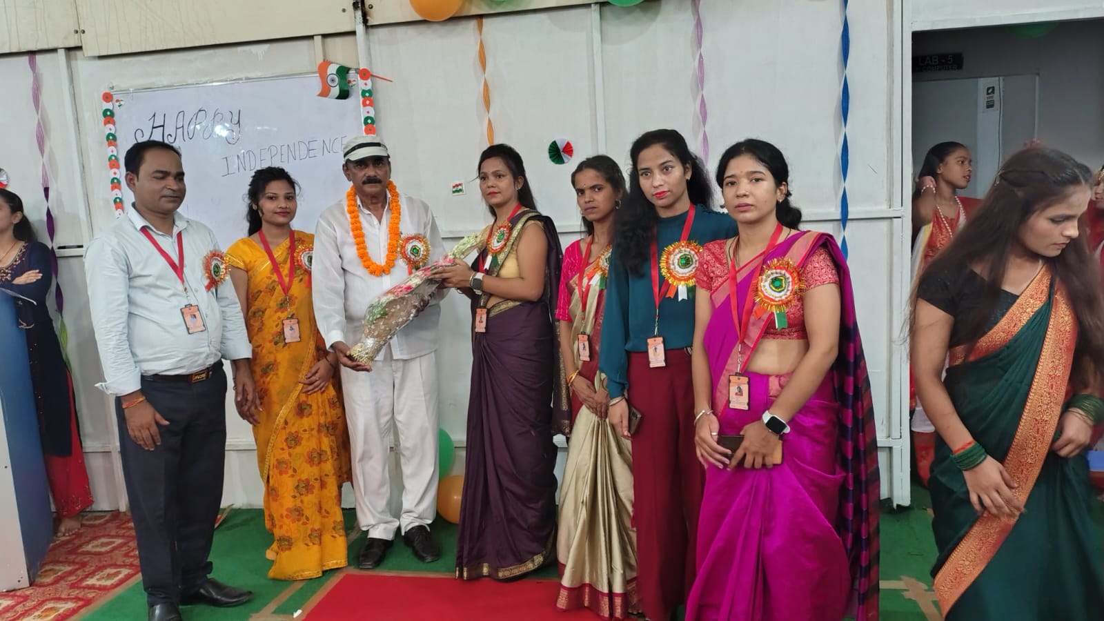 Group photo of faculty and students smiling